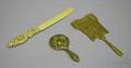 Small Brass Hand Mirror a Silver Plated Hand Mirror and a Carved Ivory Paper Knife