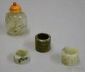 Chinese Quartz Snuff Bottle and Three Hardstone Archers Rings