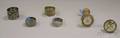 Four Victorian Silver Plated Napkin Rings and Two Small Curtain Tie Backs