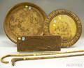 Two Bamboo Canes Two German Pyrography Decorated Wooden Trays and a Carved Wooden Fish Decorated Panele2