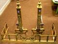 Pair of Louis XVI Style Brass Andirons and a Fireplace Fender