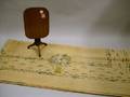 Miniature Mahogany Tilttop Stand and an Art Deco Stencil Decorated Linen Tablecloth