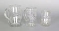 Three Stiegel type etched colorless glass mugs ca 1800