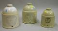 Three Labeled Stoneware Poultry Feeders