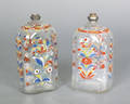 Two Stiegel type glass enamel decorated bottles ca 1800