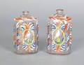 Pair of Stiegel type enamel decorated bottles ca 1800