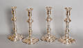 Set of four silver plate candlesticks by Mottahedeh 20th c