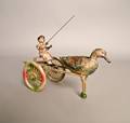 Painted tin mechanical duck drawn cart