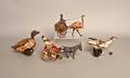 Four German tin wind up toys