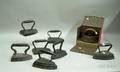 Eight Cast Iron Laundry Irons