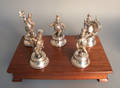 Set of five silver band figures