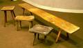 Three Rustic Wooden Stools and a Bench
