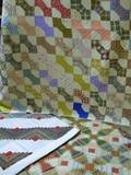Two Machinestitched Pieced Cotton Quilts and a Handstitched Pieced Cotton Quilt