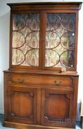 Georgianstyle Glazed Mahogany Twopart Stepback Butlers DeskBookcase