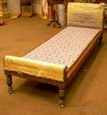 Upholstered Mahogany Turnedleg Day Bed