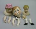 Three Reproduction Bisque Doll Heads