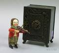 Cast Iron Still Bank and a Schuco Clockwork Clown Musician