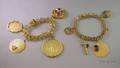 Two 14kt Gold Charm Bracelets with Assorted Gold Charms