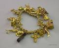 14kt Gold Charm Bracelet and Mostly Gold Charms