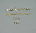 Two 14kt Gold Scallop Shell Link Bracelets a Pair of Sterling Silver Starfish Earrings and a Clam and Scallop