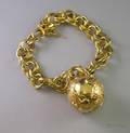 14kt Gold Charm Bracelet with a Large Gold Globe Charm