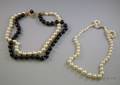 Pearl and Onyx Choker and a Graduated SingleStrand Pearl Necklace