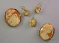 Two Silver and Marcasite Framed Shell Carved Cameo PendantBrooches a Small Cameo PendantBrooch and a Pair of Cameo Earrings