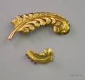 Large 14kt Gold Feather Brooch and a Small Gemset Example