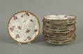 Twelve Limoges oyster plates