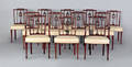 Set of twelve New York Federal carved mahogany dining chairs nine ca 1800 and three later 19th c copies