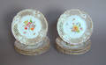Set of twelve Dresden reticulated porcelain plates