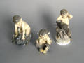 Three Royal Copenhagen satyr figures