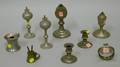 Eight Early Pewter Lighting Devices