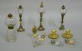 Eight Colorless Glass Peg Lamps with Seven Glass and Metal Bases