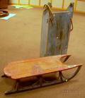 Redpainted Ironmounted Wooden Sled and a Bluepainted Wooden Utility Sled