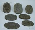 Seven Cast Iron Figural and Floral Cookie Molds