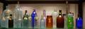 Approximately Twentytwo Aqua and Colored Glass Bottles and Jars