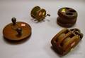 Two Fishing Reels a Block and Tackle and a Block