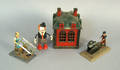 Three misc toys to include a cast iron Novelty bank 6 78 h