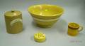 Four Pieces of Banded Yellowware and a Stoneware Rice Canister