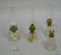 Four Colorless Glass Hand Lamps