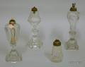 Three Colorless Cut Glass Fluid Lamps and a Pressed Glass Lamp