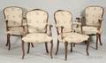 Two Near Pairs of Louis XV Style Beechwood and Needlepoint Upholstered Fauteuils