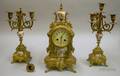 Threepiece French Gilt Brass Clock Garniture