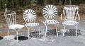Four Whitepainted Bent Steel Chairs