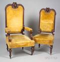 Pair of Victorian Renaissance Revival Upholstered Carved Walnut Parlor Chairs with Mask Crests