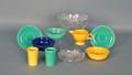 Eight pieces of Fiestaware to include three bowls