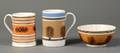 Two Mochaware Quart Mugs and a Bowl