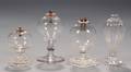 Four Small Colorless Blown Glass Fluid Lamps