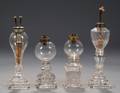 Four Colorless FreeBlown Lamps on Pressed Glass Bases